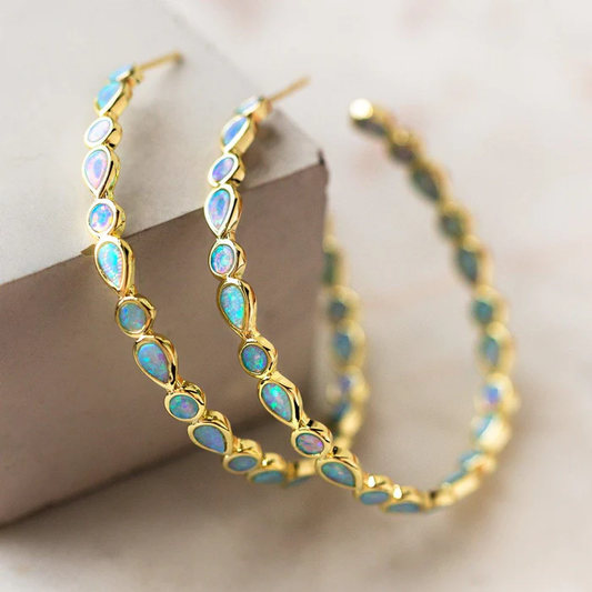 Retro Gyldne Hoops med Blå Opal